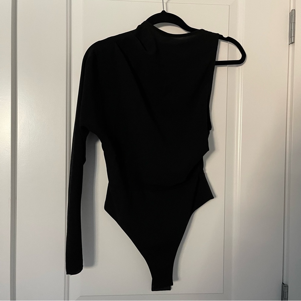MISHA BLACK ONE SHOULDER BODY SUIT.